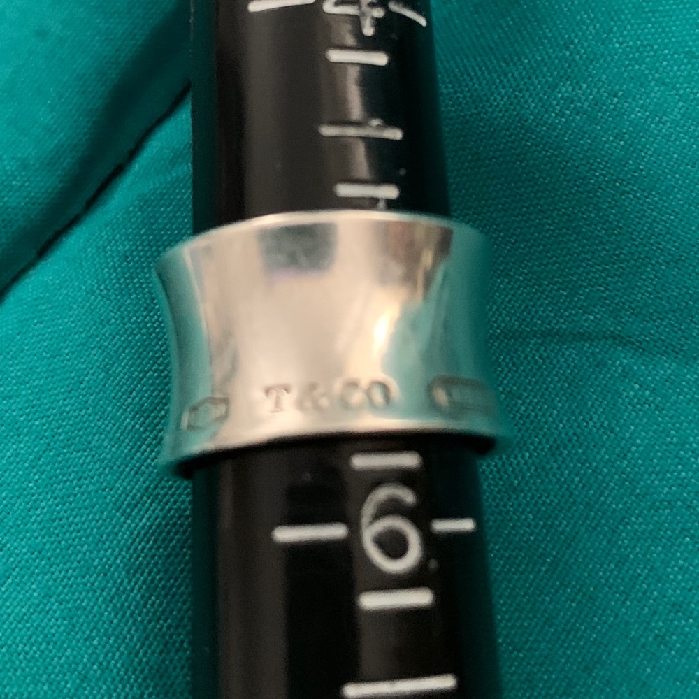 Authentic Tiffany and CO cigar band ring.